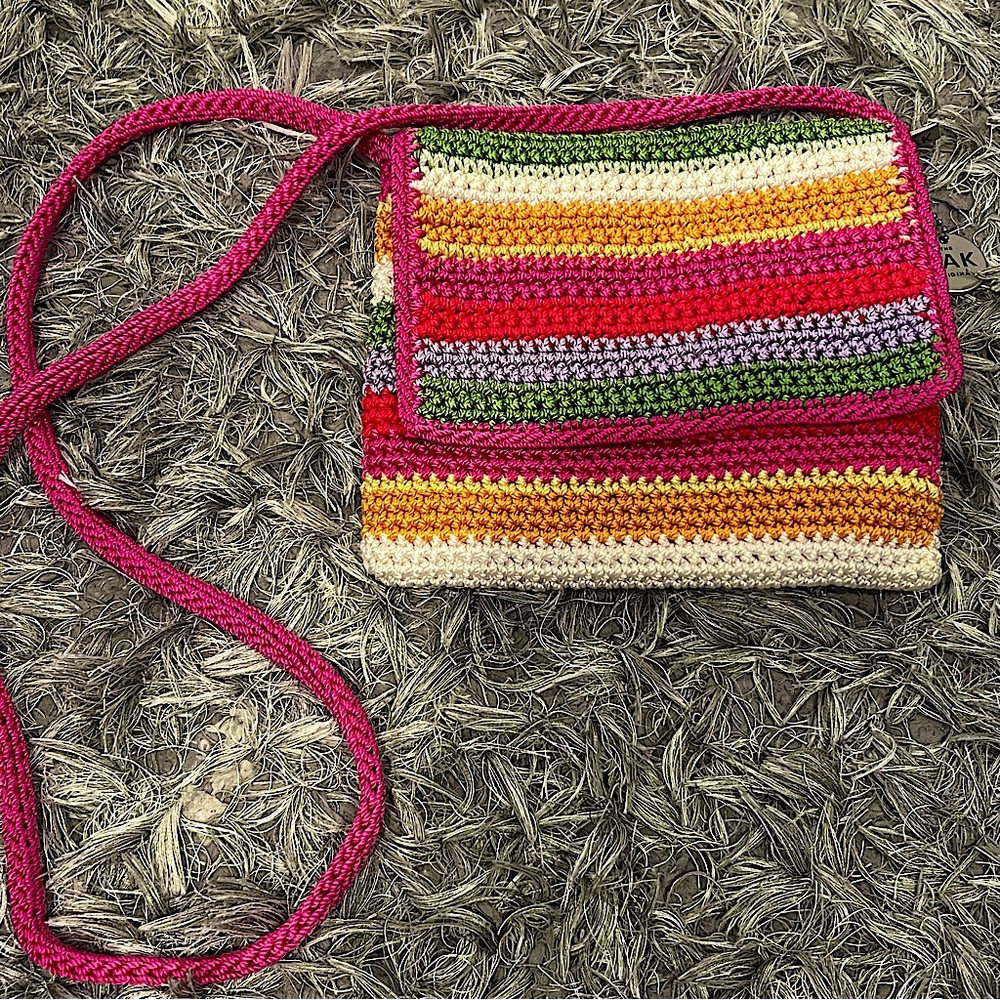 Crochet crossbody bag by The Sak